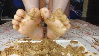 Messy cake mushing with feet