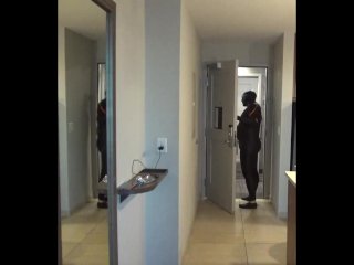 wetsuited orca almost caught at hotel door