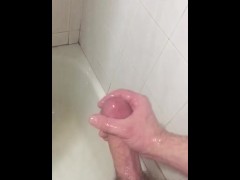 Stroking myself hard in the shower before I shaved my balls.