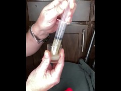 loading a syringe of my thawed cum loads to inject into my wife’s pussy (surprise)