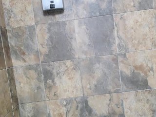 Stud eats his cum after fucking himself in gym shower after workout