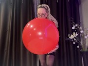 Preview 6 of Looner girl in glasses and red PVC dress blow BIG red balloon and pop it with ass. DM to get full