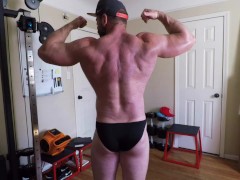 Madison works out and pumps and flexes his chest and arms