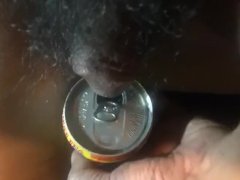 Pissing on a Thai tea soda can