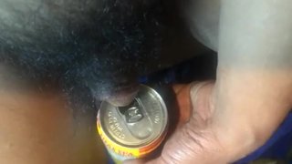 Pissing on a Thai tea soda can