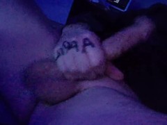 Stroking my cock.