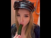 Preview 2 of A baby with bare tits plays with a cucumber and sucks it with her mouth.