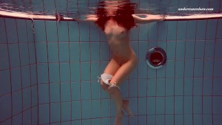Watch Alla swim naked in the hot pool