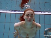 Preview 2 of Big tits Lola stripping in the pool for you