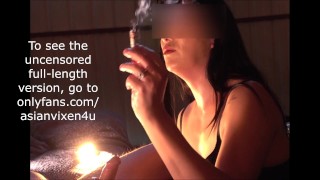Gemene Japanse bitch geeft handjob tijdens het roken
