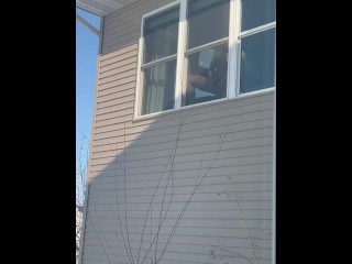 Public Masturbation: Sexy Horny MILF Gets Caught by Neighbors Masturbating in Window with Big Dildo.