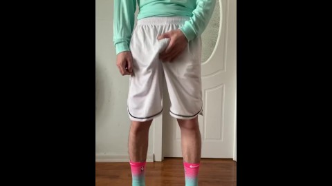 Wearing a sky blue basketball uniform and masturbating