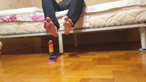 Man foot fetish near the dildo