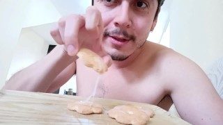 Milk and cookies? Handsome man cums on his cookies and eats them