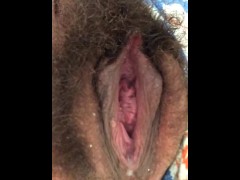 Closeup of my hairy pussy pissing and contracting