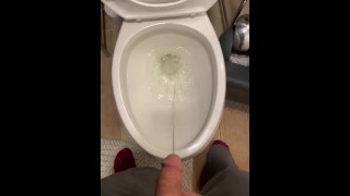 Draining cock full of piss
