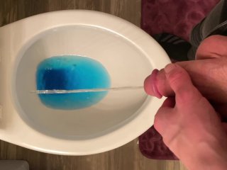 Petite teen pisses before leaving the house.