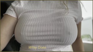 MILF big tits braless jumping on the trampoline