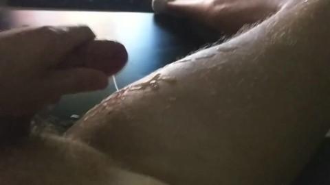 Baseball player strokes huge cock and explodes huge cum shot