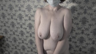 Mature BBW MILF gets naked and shows her big saggy soft natural tits.