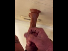 Braun Strokes fucks, frots, and sucks cum off dildo in shower
