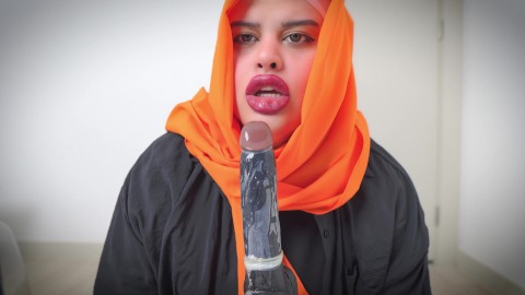 Arab deepthroats a dildo and her ass is open