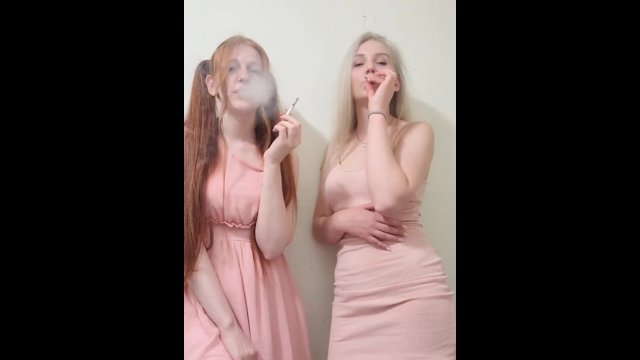 Two girls Smoking cigarettes
