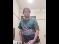 Clothes on, cock out and cumming.