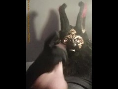 Anubis towers above you stroking his huge cock until he unloads into your hungry mouth