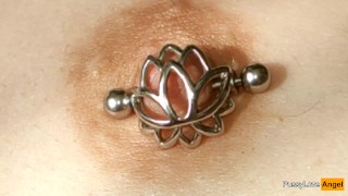I change nipple piercings to nipple cages so that the small bitch does not play with them