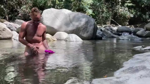 Trans guy ftm jacking off big clit with sex toy in the river