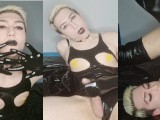 Kinky sissy in shiny latex bodysuit and high boots plays with cock and cums in her mouth