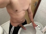 Hot bodybuilder man rubbing a giant dick in the gym bathroom. I doubt you don't enjoy