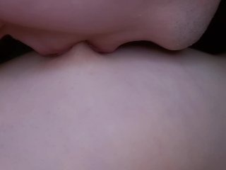 I lick my girlfriend's nipples slobberingly. She moans loudly in pleasure