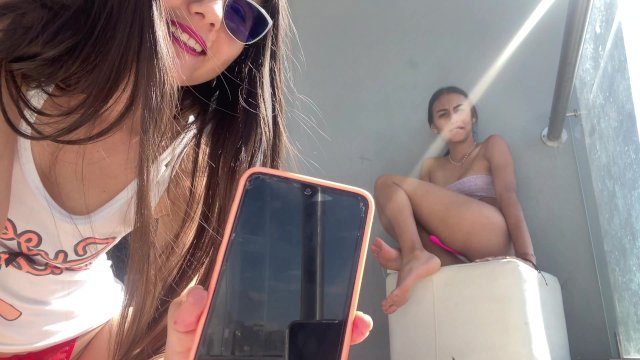 My sister in law takes control of my Lovense vibrator and makes me cum on the balcony of the buildin