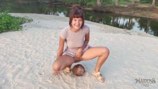 A Timid Young Lady Squirts A Small Trickle Of Pee On A Coconut