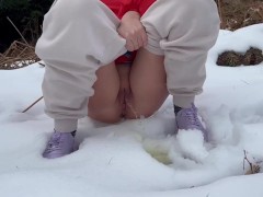 Girl pissing in the snow