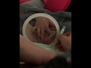 Paraplegic girl intermittent cathing while in bed