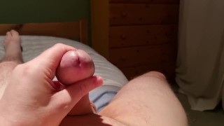 Rubbing my cock.