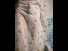 Trying to hide a desperate piss with the shower curtain