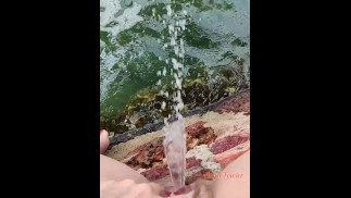 Strong Long Power Pissing in the river