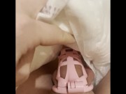 Preview 3 of sissy in chastity pees her diaper and plays with soaked diaper