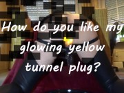 Preview 1 of How do you like my glowing yellow tunnel plug?