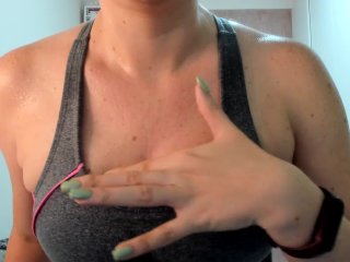 sweaty young woman returning from the gym in gym clothes