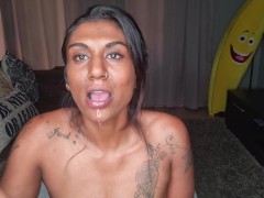 Desi sits on the couch drooling as she sticks out and wiggles her tongue around