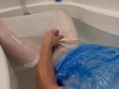 Plastic Bag Man taking a fun bath