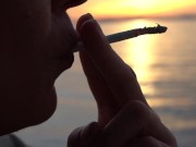 Preview 3 of Smoking 2 Cigarettes on the Beach... at day and in Sunset