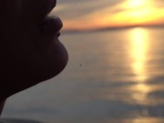 Preview 4 of Smoking 2 Cigarettes on the Beach... at day and in Sunset