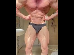 Hot bodybuilder posing in jockstraps