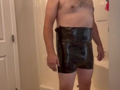 Plastic Bag Man Trying on Sexy Black Tight Pants - Screenshot 15 of 16 - Male